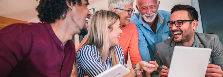 Team of family members and colleagues collaborating during a business meeting, exemplifying improved family business dynamics