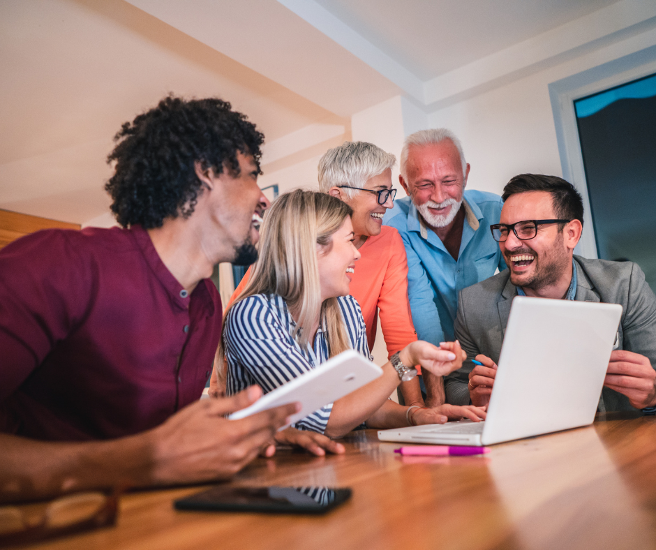 Team of family members and colleagues collaborating during a business meeting, exemplifying improved family business dynamics